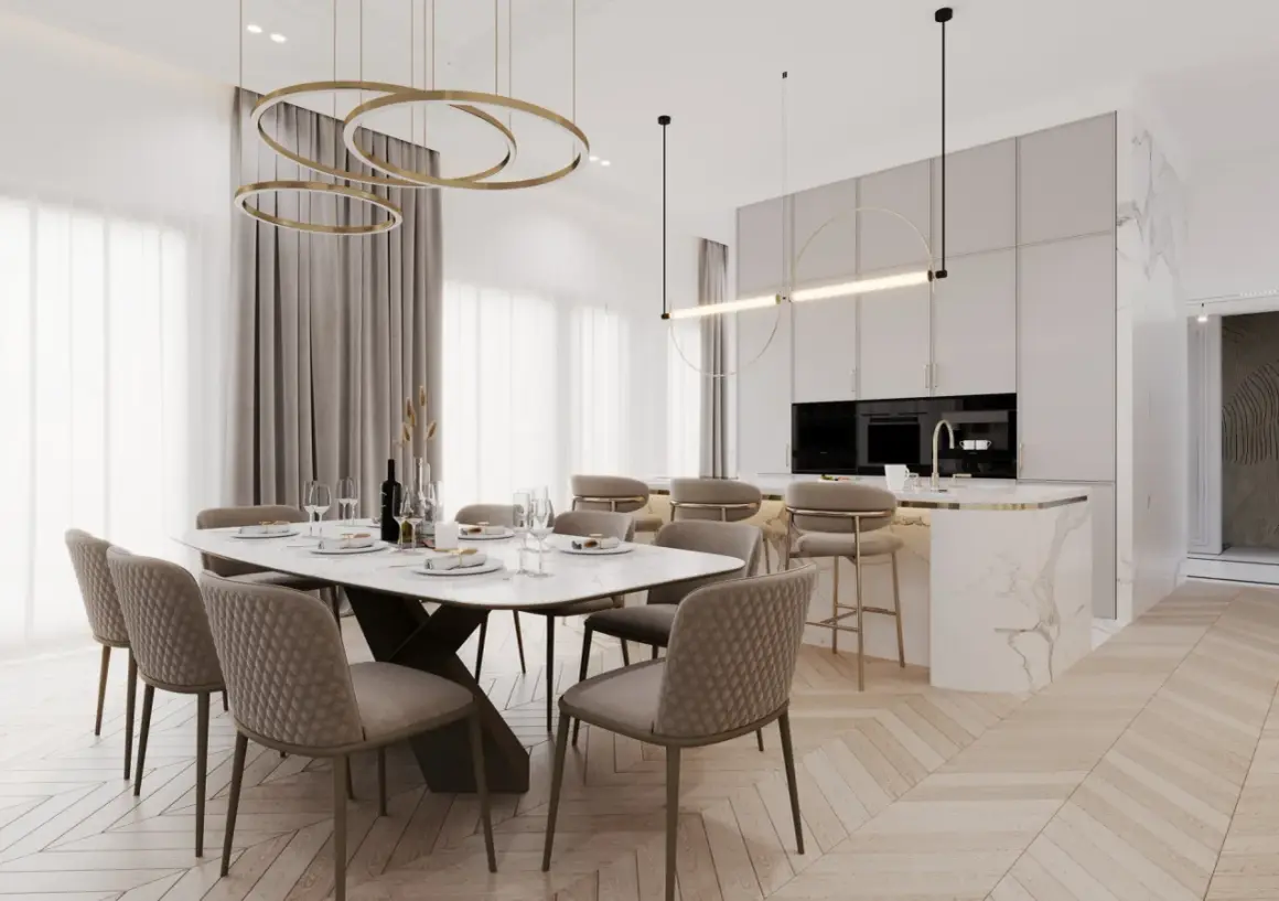 Elegancka jadalnia i kuchnia w stylu modern classic z marmurową wyspą i złotymi akcentami.